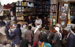Yemeni people do shopping ahead of Muslims' holy month Ramadan at Al-Mih market, the oldest market in capital Sanaa, Yemen on March 31, 2022.
