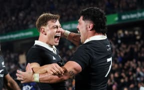 Du’Plessis Kirifi celebrates with Ruben Love.
