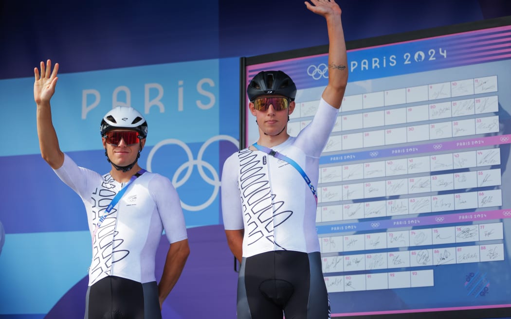 New Zealand cyclists Corbin Strong (L) and Laurence Pithie ahead of the Olympic men's road race.