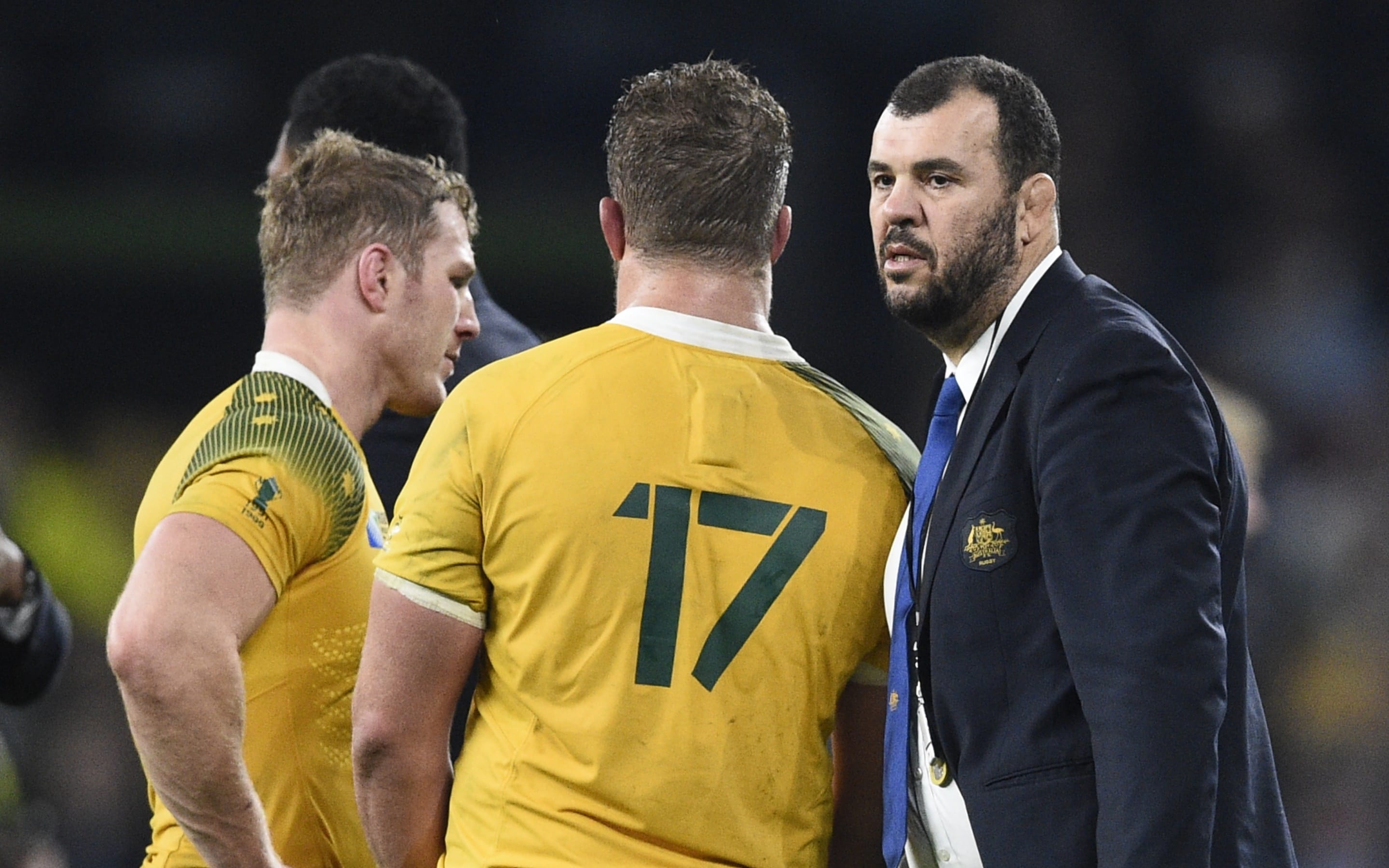 Australia's head coach Michael Cheika (R) reacts after losing the final match of the 2015 Rugby World Cup between New Zealand and Australia at Twickenham stadium, south west London, on October 31, 2015.