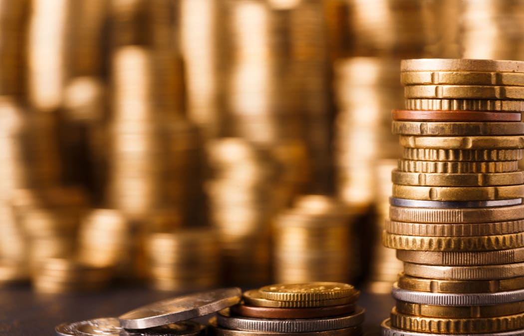Golden coin stacks, cryptocurrency.