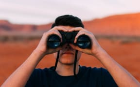 Spying man