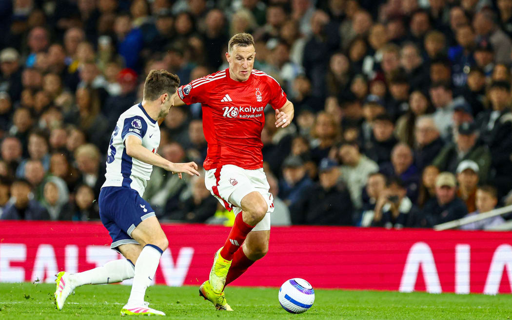 Chris Wood (11) of Nottingham Forest and Ben Davies (33) of Tottenham Hotspur during the English championship Premier League football match between Tottenham Hotspur and Nottingham Forest on 21 April 2025 at Tottenham Hotspur Stadium in London, England - Photo Nigel Keene / ProSportsImages / DPPI (Photo by Nigel Keene / ProSportsImages / DPPI via AFP)