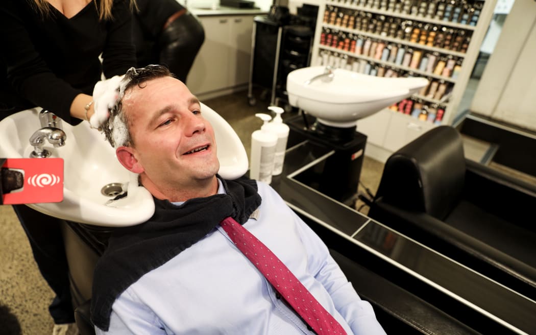 Seymour getting a haircut at Rodney Wayne in New Market, Auckland.