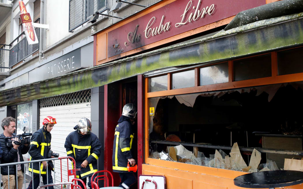 The scene of the fire, where 13 people died.