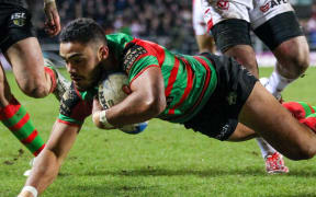 The Rabbitohs' Dylan Walker scores a try.