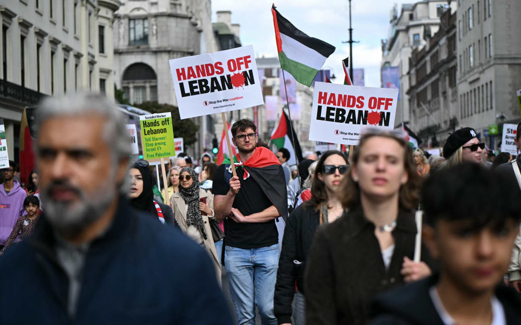 Pro-Palestinian activists and supporters wave flags and hold placards as they pass through central London, during a March for Palestine on October 5, 2024. - A Hamas attack on October 7, 2023 resulted in the death of 1,205 people on Israeli side, most of them civilians, according to an AFP tally based on official Israeli figures, which includes hostages killed in captivity. Out of 251 people taken hostage that day, 97 are still being held inside the Gaza Strip, including 33 who the Israeli military says are dead.
Israel's retaliatory offensive in Gaza has killed at least 41,788 people, the majority of them civilians, according to figures provided by the Hamas-run territory's health ministry. The United Nations has described the figures as reliable. (Photo by JUSTIN TALLIS / AFP)