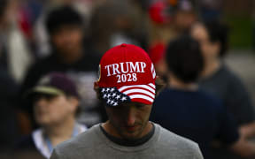 A man wears a "Trump 2028" cap in September, 2025.