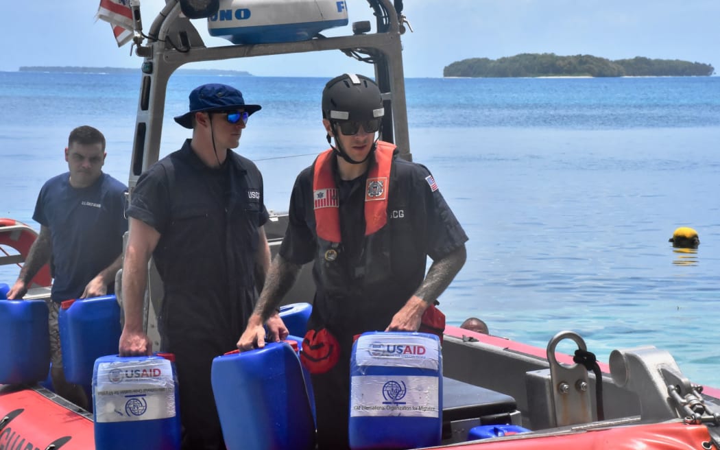 The crew of USCGC Oliver Henry (WPC 1140) delivers drought relief supplies, reverse osmosis systems, and technicians to Woleai, Yap State, Federated States of Micronesia, on April 12, 2024, in support of a request from the U.S. Embassy, in partnership with USAID and the International Organization for Migration (IOM). The support provided to the four outer island communities of Satawal, Woleai, Fais, and Ulithi highlights the U.S. role in providing essential aid and strengthening community resilience against