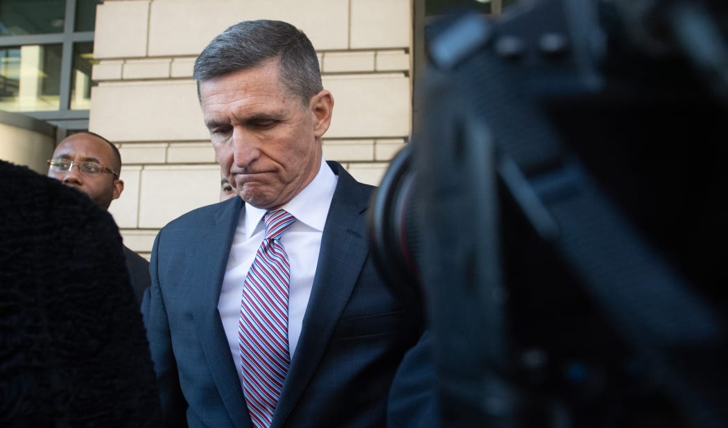 (FILES) In this file photo taken on December 18, 2018 former National Security Advisor General Michael Flynn leaves after the delay in his sentencing hearing at US District Court in Washington, DC.