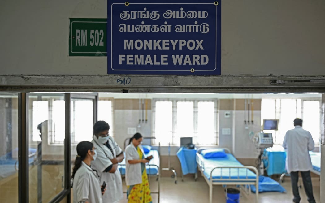 Doctors are pictured inside a newly created mpox isolation female ward at a government hospital in Chennai on August 27, 2024. Formerly known as monkeypox, mpox is an infectious disease caused by a virus transmitted to humans by infected animals that can also be passed from human to human through close physical contact. (Photo by R.Satish BABU / AFP)