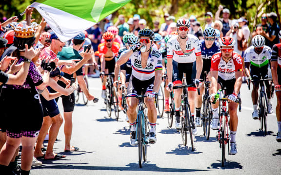 Santos Tour Down Under 2019 Be safe be seen MAC Stage 6 - Adelaide, Australia - Peter Sagan and Adam Blythe both accepted beers from the road side during the final ascent of Willunga