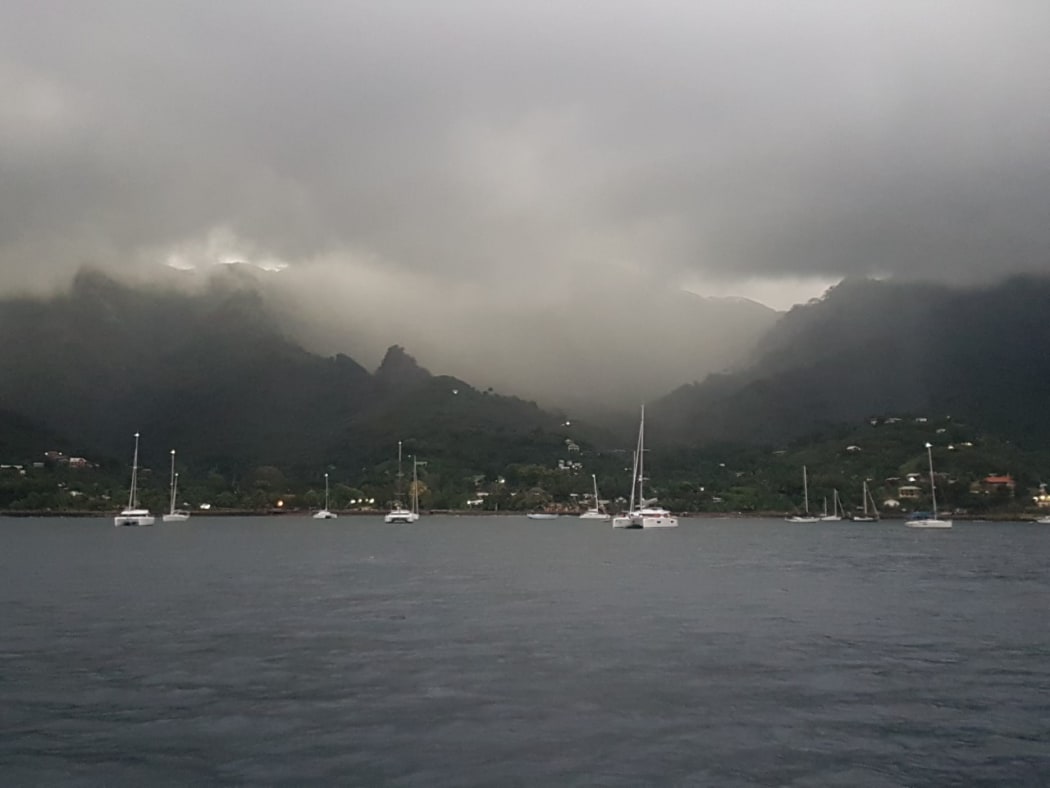 Boats at Nuku Hiva, Marquesas, French Polynesia.