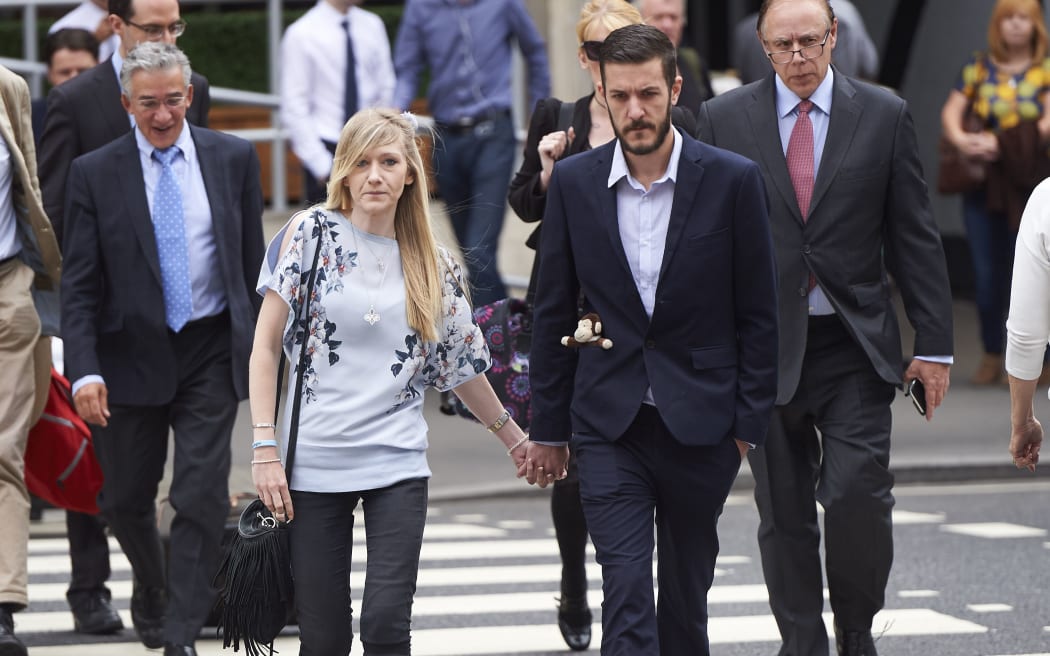 Connie Yates and Chris Gard, the parents of terminally ill 11-month-old Charlie Gard, arrive at the High Court in central London on July 14 for continued hearings.