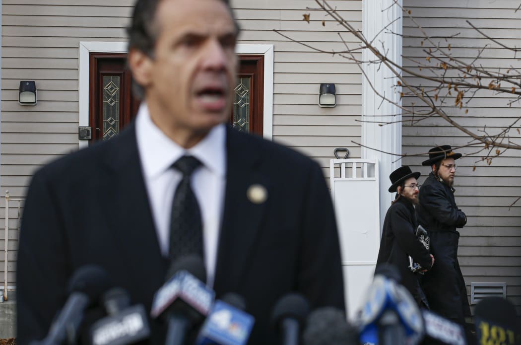 New York Governor Andrew Cuomo speaks to the media outside the home of rabbi Chaim Rottenbergin Monsey, in New York on December 29, 2019 after a machete attack that took place earlier outside the rabbi's home during the Jewish festival of Hanukkah in Monsey, New York.