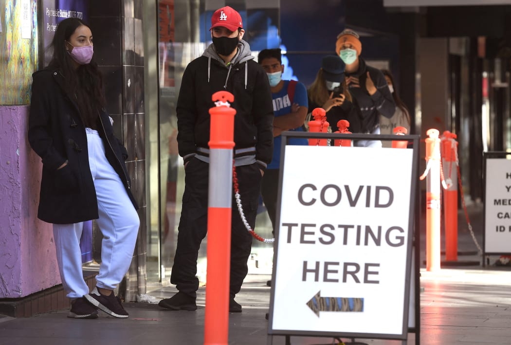 People queue up for Covid-19 testing in Melbourne on May 12, 2021, after a man tested positive to Covid-19 in the first community case in the city for two months.