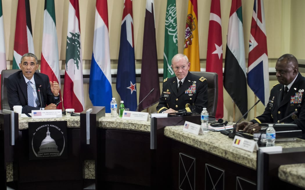 US President Barack Obama, left, with US Army General and Chairman of the Joint Chiefs of 
Staff Martin Dempsey, and US Army General Lloyd Austin, the head of US Central Command,  following the meeting at Andrews Air Force Base.
