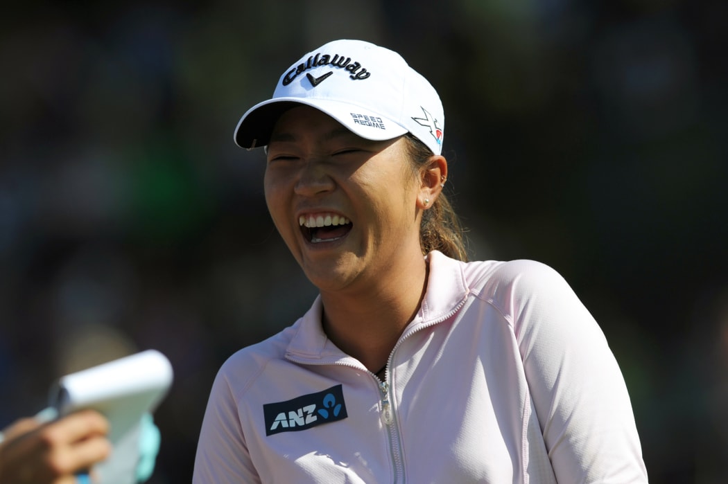 Lydia Ko reacts after winning the Evian Championship on September 13, 2015 in the French Alps town of Evian-les-Bains.