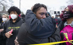Family of Daunte Wright, who was shot by an officer during a traffic stop in Brooklyn Center near where Derek Chauvin is on trial in the death of George Floyd, react in Brooklyn Center, Minnesota, United States on April 11, 2021.