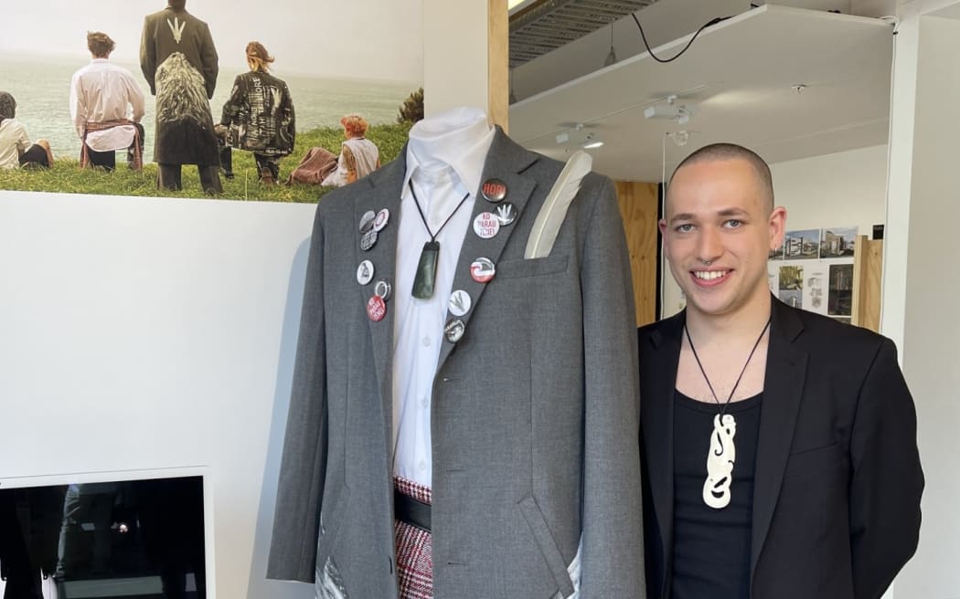 Vince Ropitini with a piece from his designs.