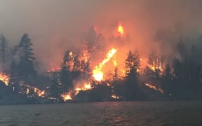 Flames rise into the sky in drought-stricken California.