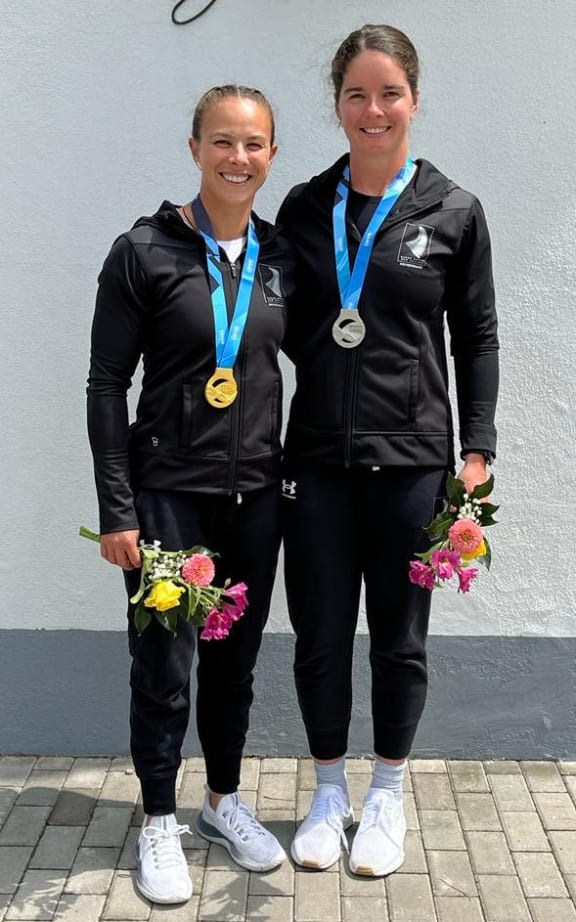 New Zealand canoe sprint athletes Dame Lisa Carrington and Aimee Fisher after winning gold and silver at the 2023 World Cup regatta in Hungary.
