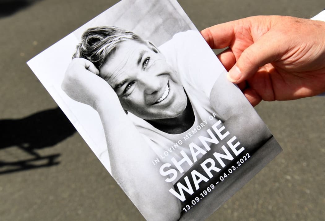 A funeral program is held after a private memorial service for Australian cricket superstar Shane Warne in Melbourne on March 20, 2022.