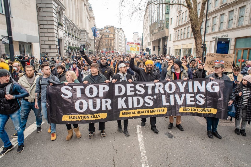 Thousands of people are seen gathering in London to protest against lockdown measures in London, UK, on March 20, 2021.
