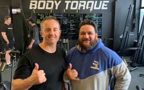 Trainer Alex Flint and former All Black Piri Weepu on the set of Match Fit.