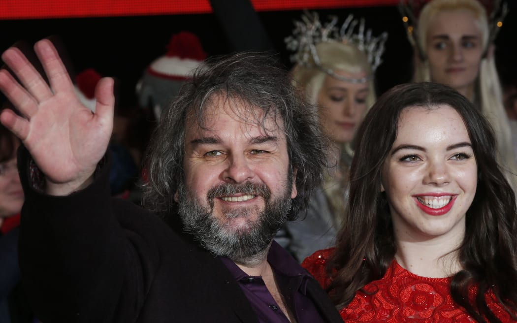Sir Peter Jackson with his daughter Katie Jackson as they arrive at the premiere of "The Hobbit: The Battle of the Five Armies.