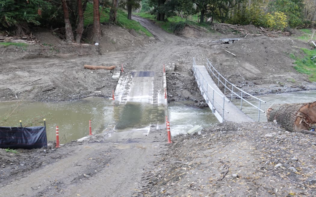 This ford and walk bridge, pictured in early May, provide temporary access to Charlie and Hamish Menzies' farm in the Tararua District.