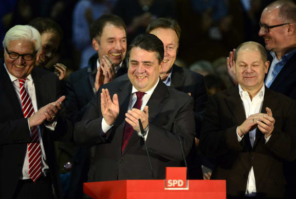 SPD leader Sigmar Gabriel, centre, and party members.
