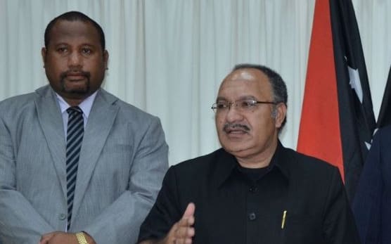 Members of PNG's government, including Energy and Petroleum Minister, Nixon Duban (far left) and Prime Minister Peter O'Neill (talking) with PNG Power figures and ExxonMobil PNG Production Manager Andrew Barry.