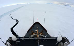 A file photo shows US Coastguard icebreaker Polar Star in action.
