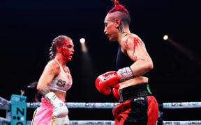 Blood pours from the hairline of Shannon O’Connell during in the Catchweight fight against Mea Motu in Sydney.