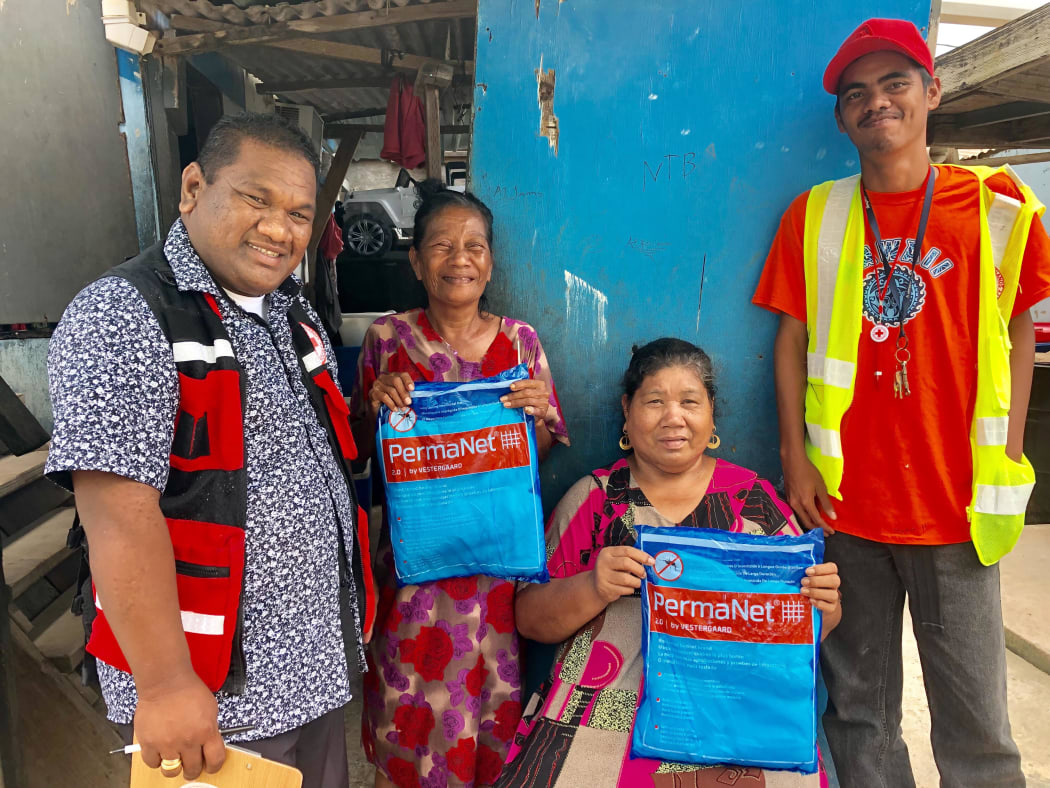 Red Cross volunteers have been active in distributing mosquito nets to residents in Ebeye (pictured) and Majuro as the dengue outbreak has continued for three months.
