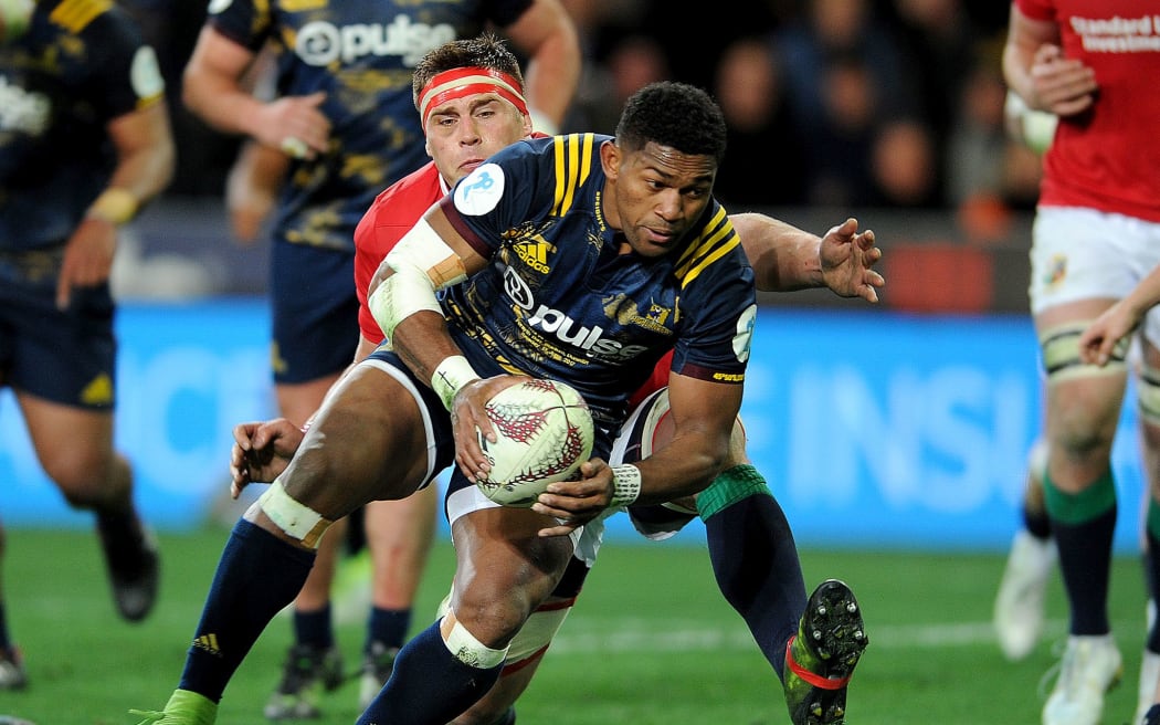 Waisake Naholo scores a try during the Highlanders clash with the Lions.