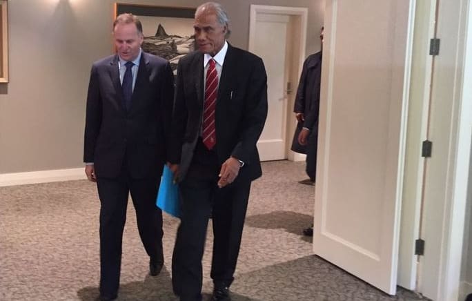 John Key walks with 'Akilisi Pohiva at Government House in Auckland