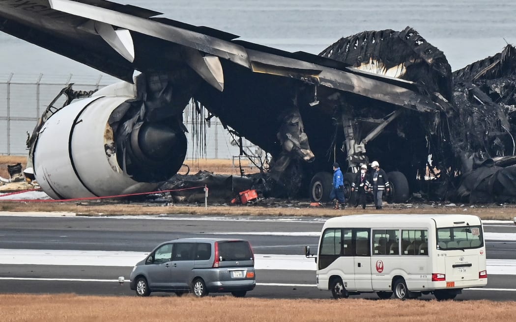 Doomed Japan plane on third quake mission when runway disaster hit