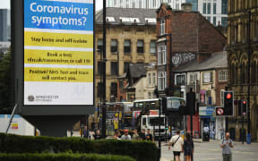 Billboard displays Covid-19 message in Manchester City.