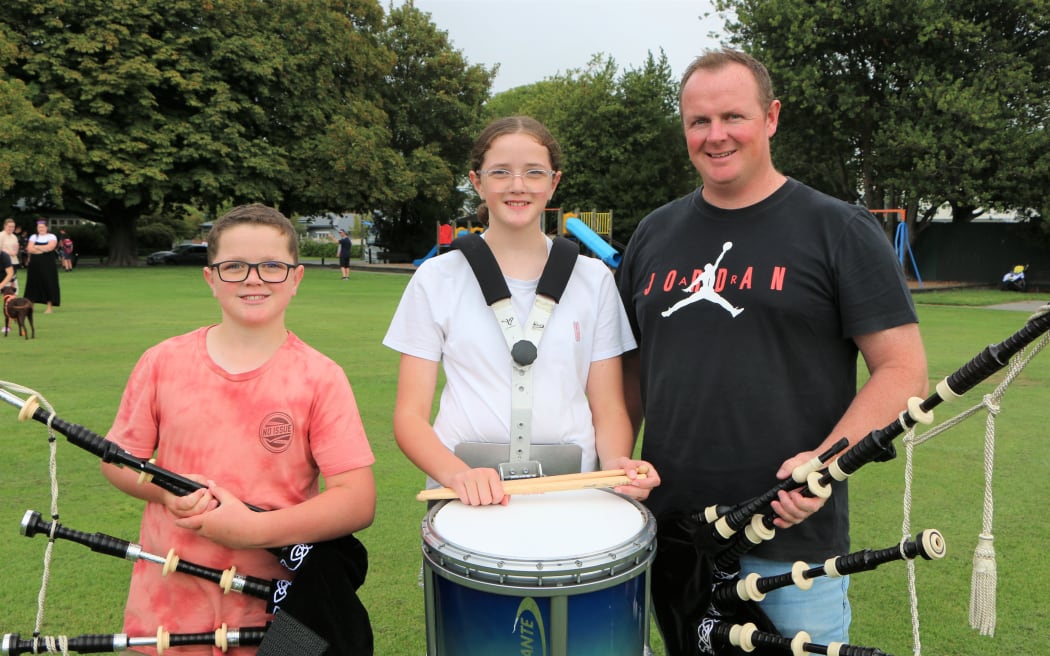 The Marshall family with their instruments.
