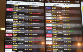 The arrivals board at the Auckland Airport's international terminal on 19 March