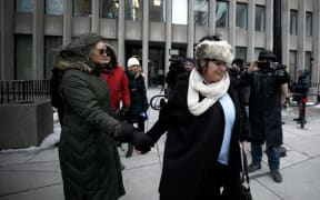 Shelly Kinsman (R) leaves the Toronto Courthouse in Toronto, Canada on February 8, 2019 after the sentencing of Toronto serial killer Bruce McArthur. Shelly's brother Andrew Kinsman was one of McArthur's victims.