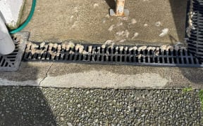 Wastewater and sewage pooling in Cockburn St backyards in Masterton.
