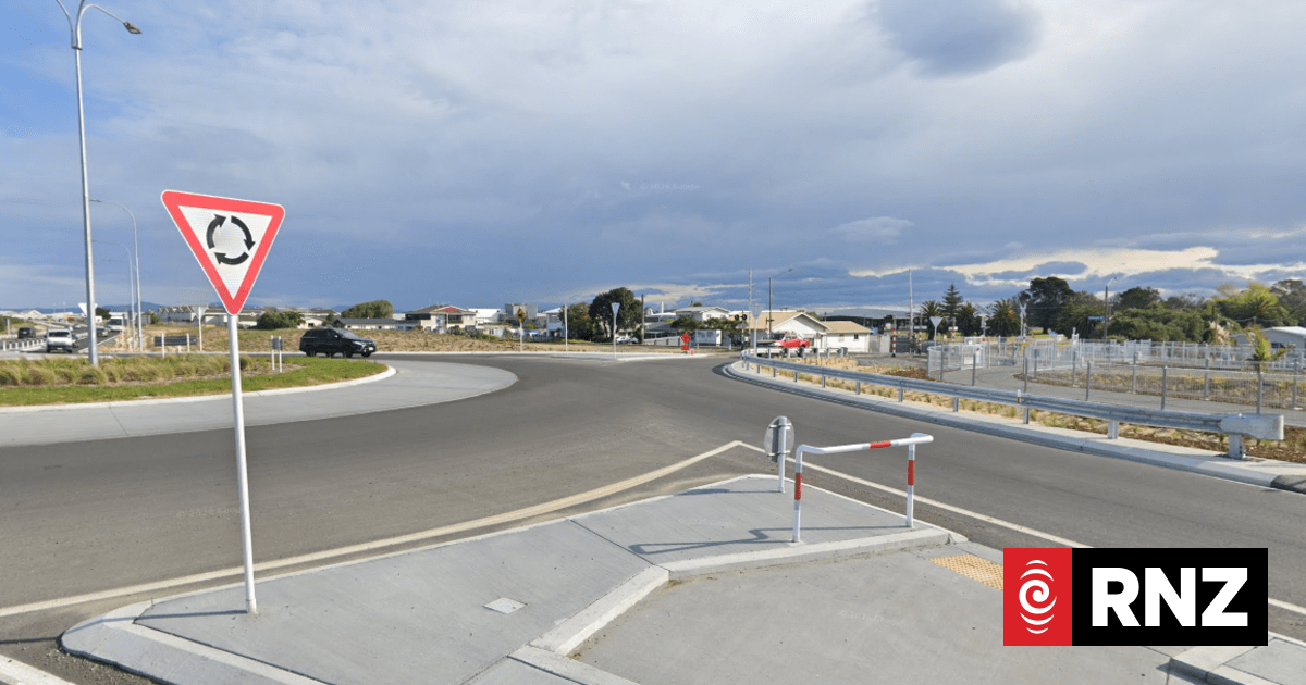 Truck rolls in Napier, blocking highway
