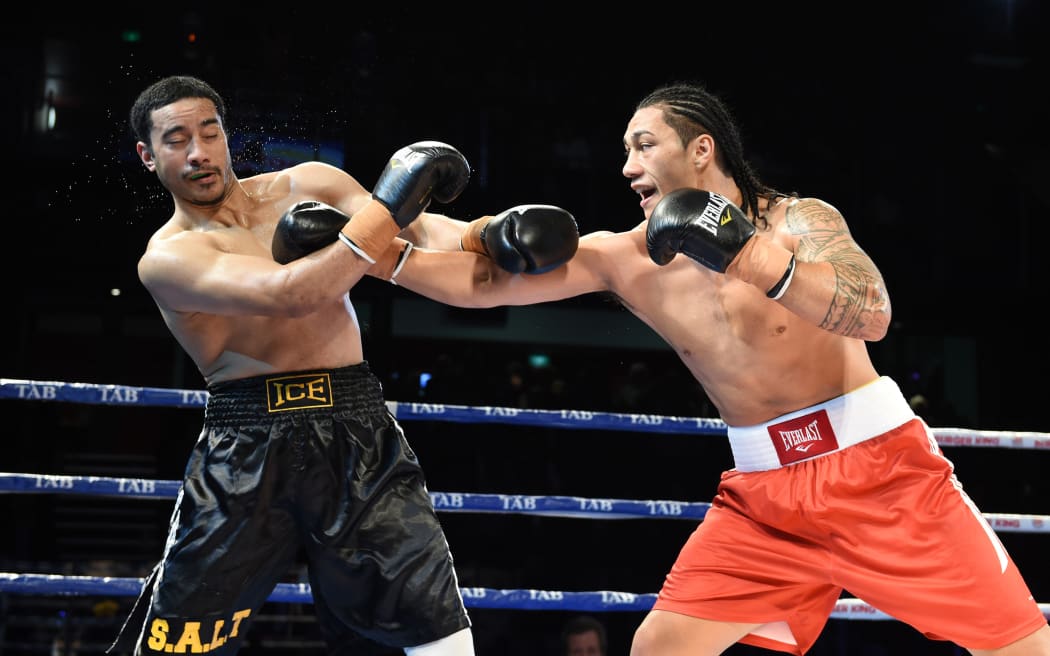 Jai Opetaia (red trunks) vs Isileli Fa on the undercard at The Burger King Road to the Title at ILT Stadium Southland in Invercargill, August 2015.
