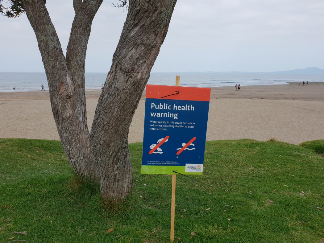 A swimming warning sign at Brown's Bay beach in Auckland.