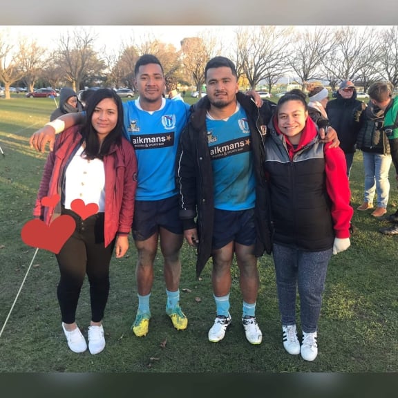 Hooker Siua Maile (2R) with family after a game for Shirley Vikings.