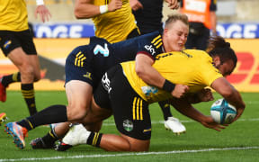 Pouri Rakete-Stones scores a try during the Super Rugby Highlanders v Hurricanes  match.