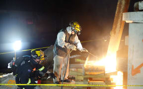 Team members must use a core drill, thermal lance and hydraulic chainsaw to cut through steel and concrete.
